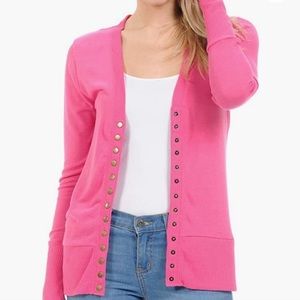 Pink Cardigan Sweater. Snap front closure. Soft material. Size Large